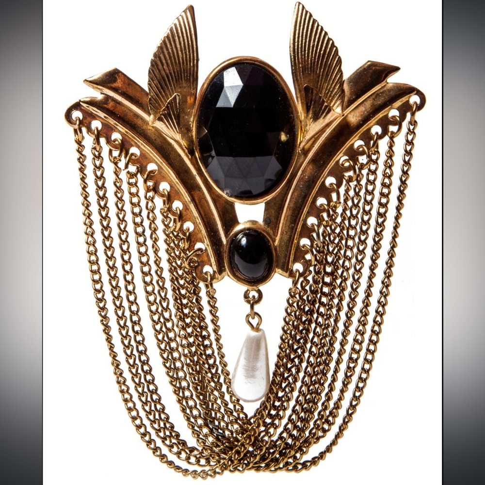 VINTAGE BLACK AND PEARL BROOCH DRIPPING IN GOLD WASHED CHAINS, CIRCA 1980’S